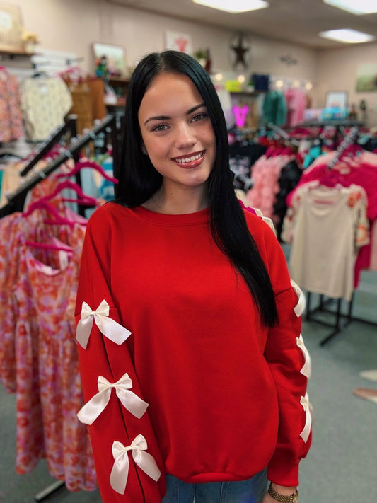 Red Sweatshirt with Bows on Sleeves