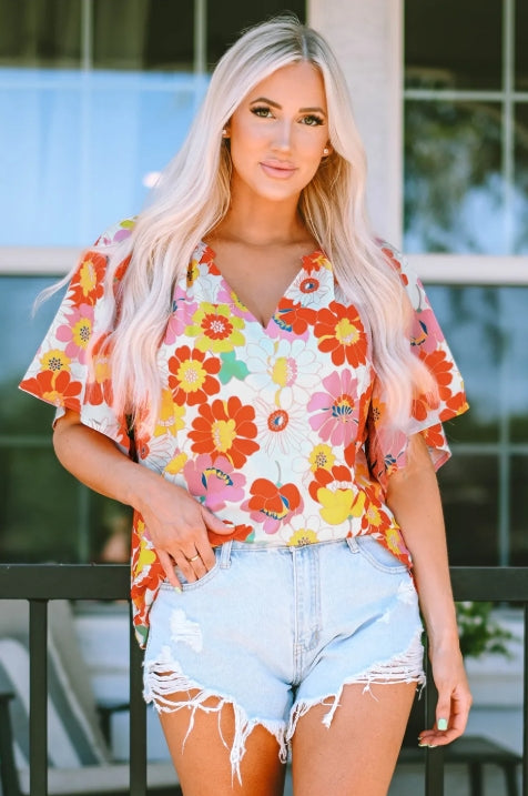Orange Abstract Print V Neck Half Sleeve Blouse