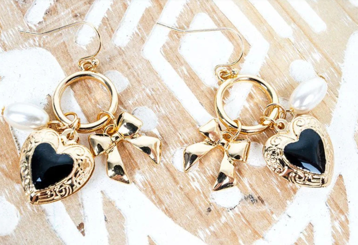 Heart In A Knot Black and Goldtone Earrings